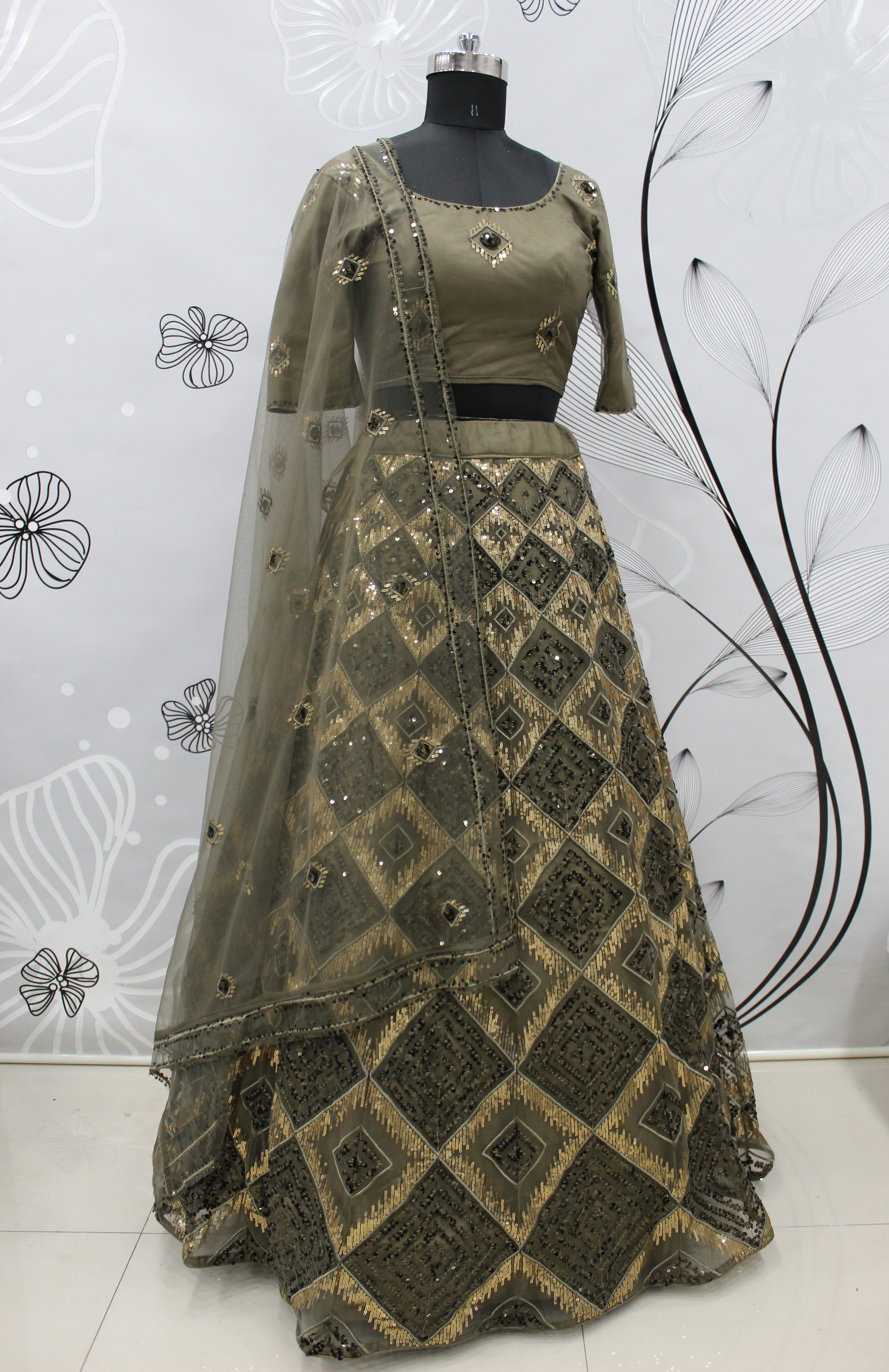 Lehenga Choli in Olive green Net with Embroidered